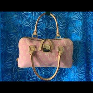 Pink signature Dooney and Bourke. Almost new. See pictures for dimensions.